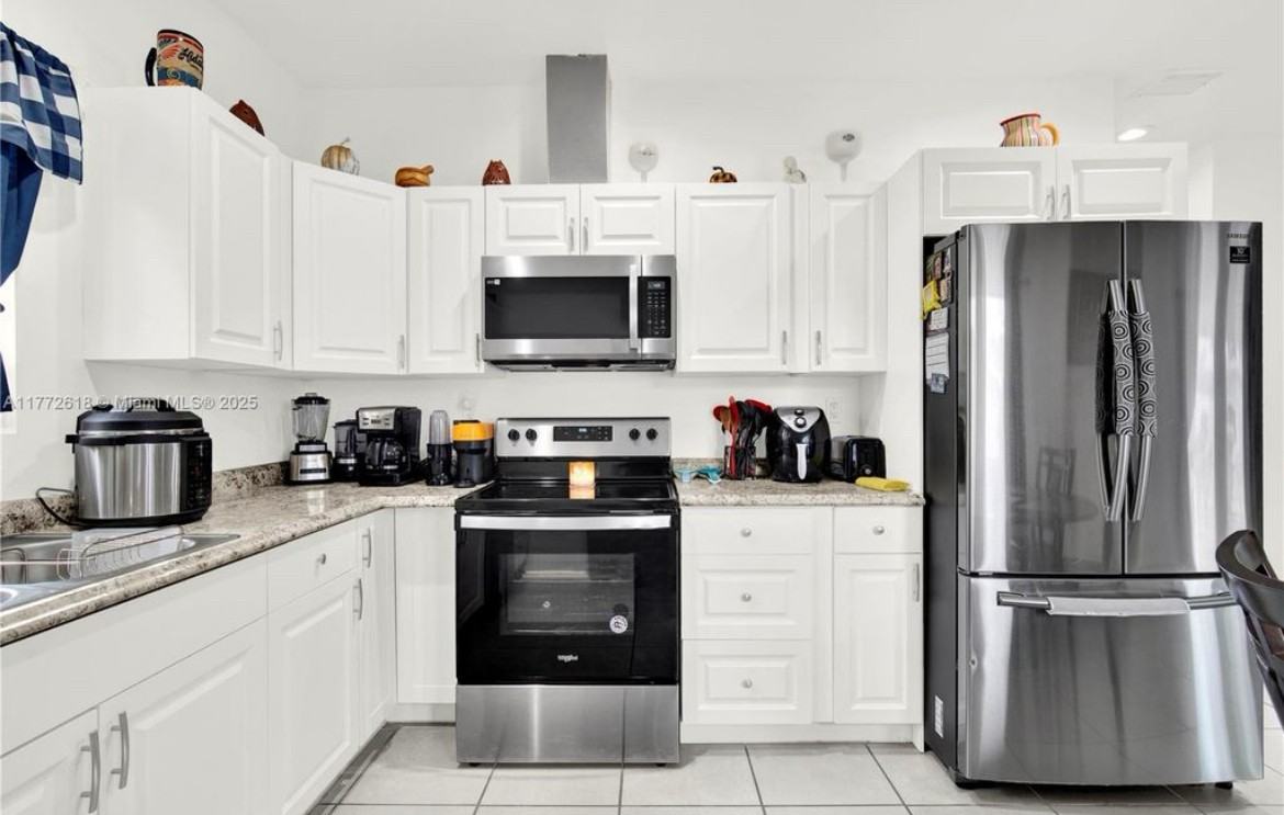 1715 NW 68th St - Photo 4 of 13