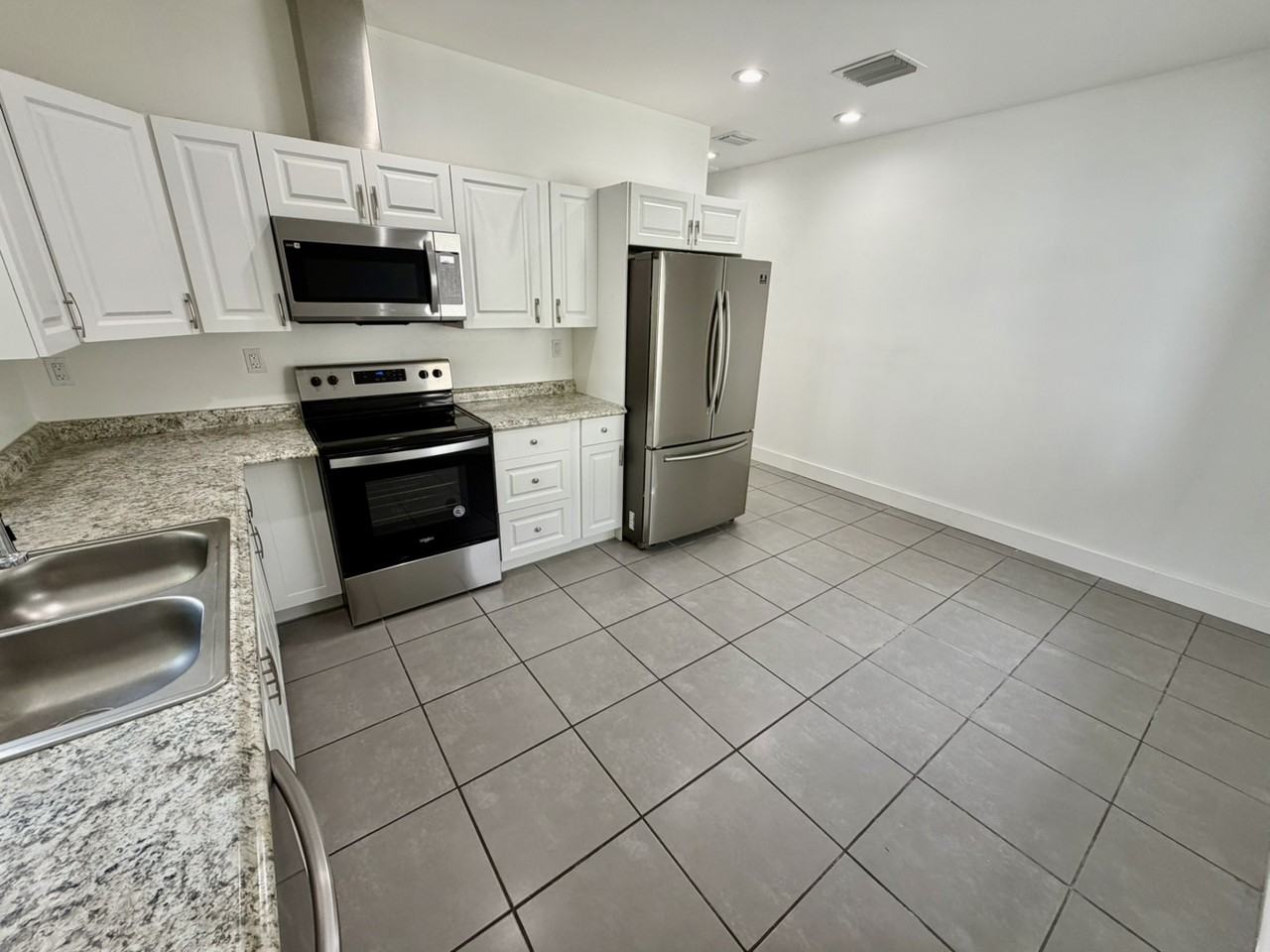 1715 NW 68th St - Photo 6 of 13