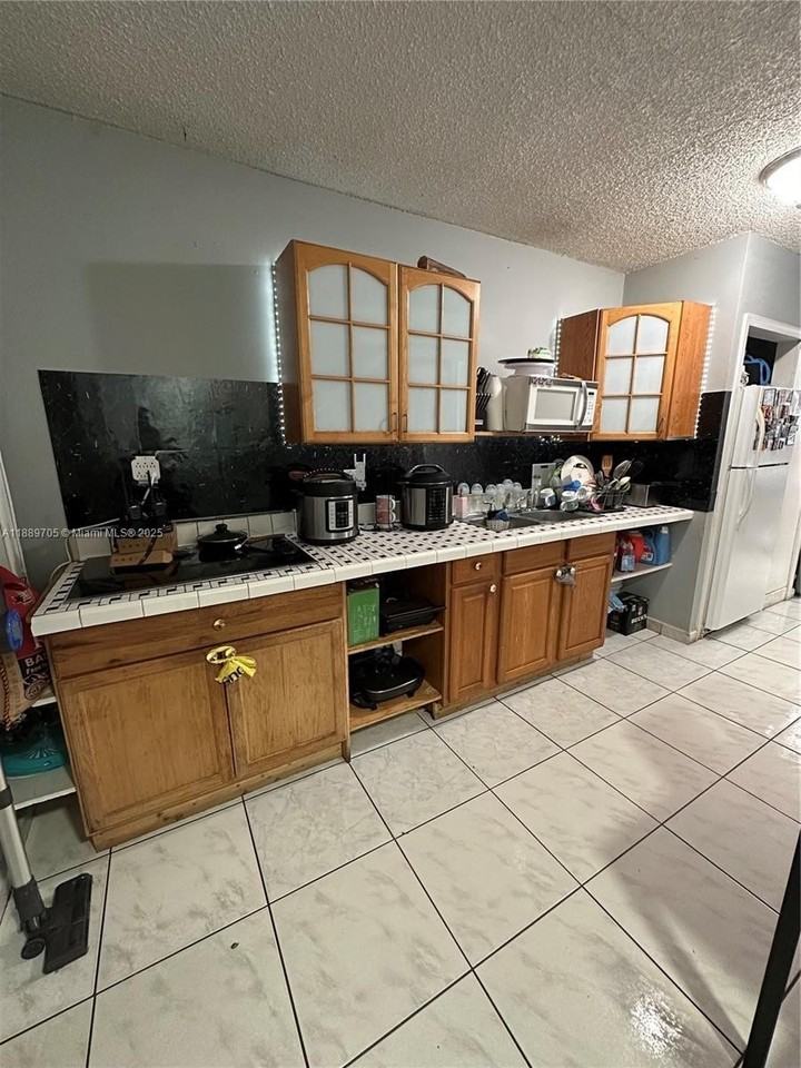 16901 Northwest 51st Place #C - Photo 5 of 13