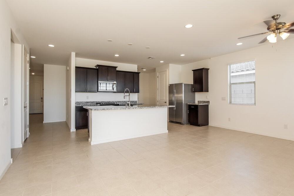 11010 W Luxton Ln - Photo 4 of 16