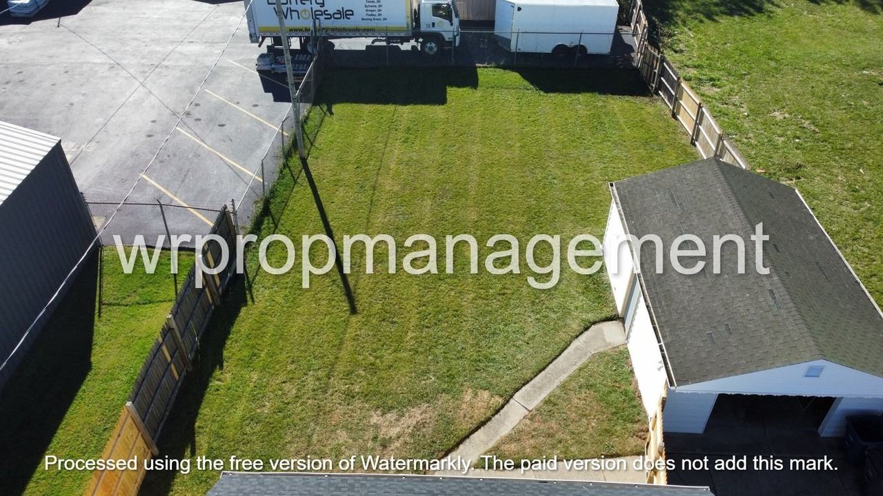 1521 W Alexis Rd - Photo 4 of 12