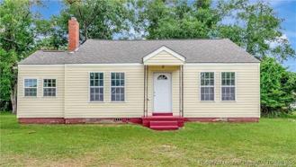 1209 E 6th St - Photo 1 of 1