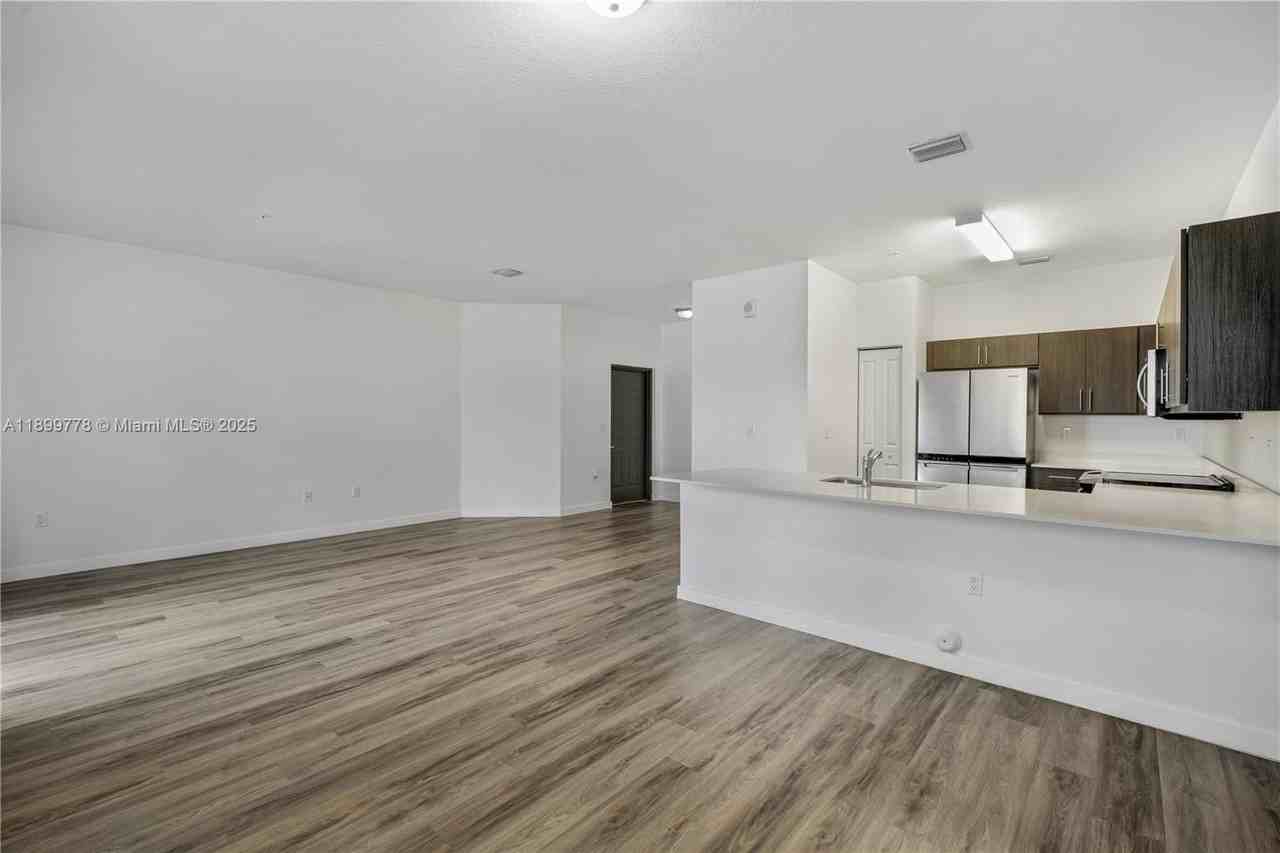 15500 Southwest 136th Street #103 - Photo 4 of 24