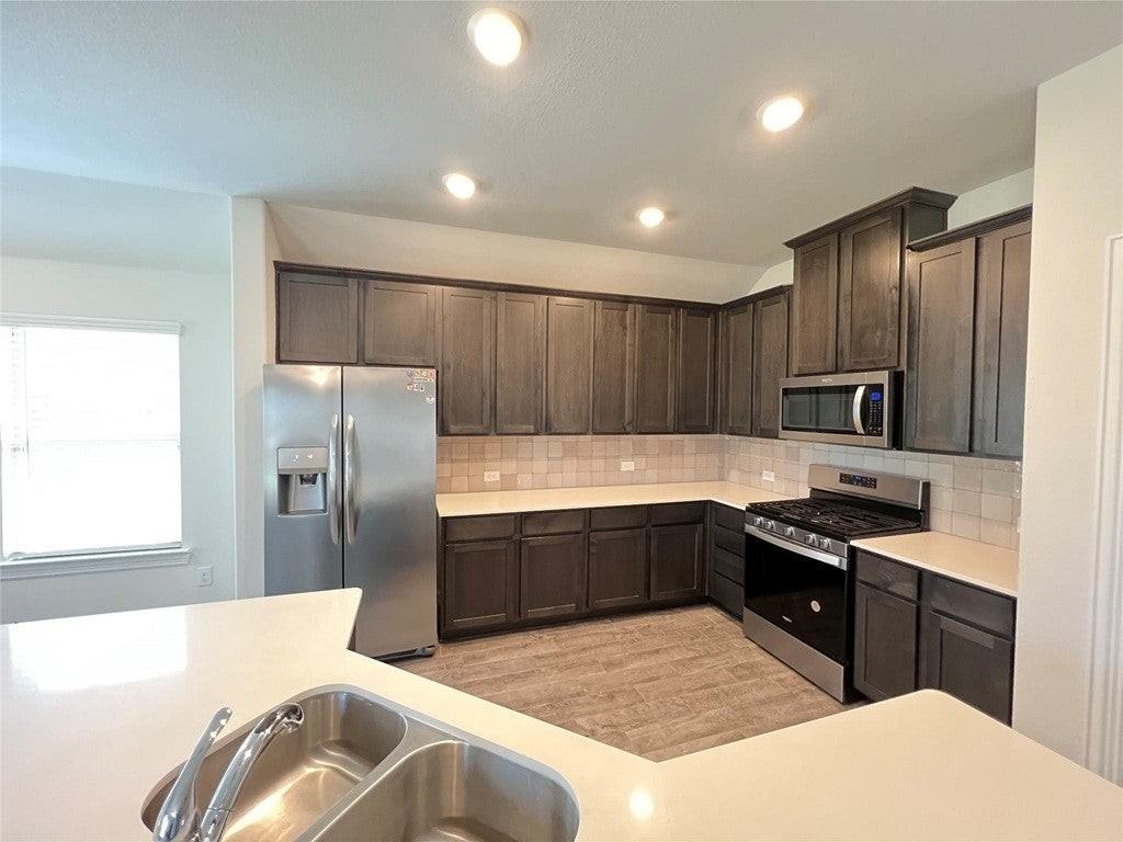 11221 Ranchera Dr - Photo 5 of 15