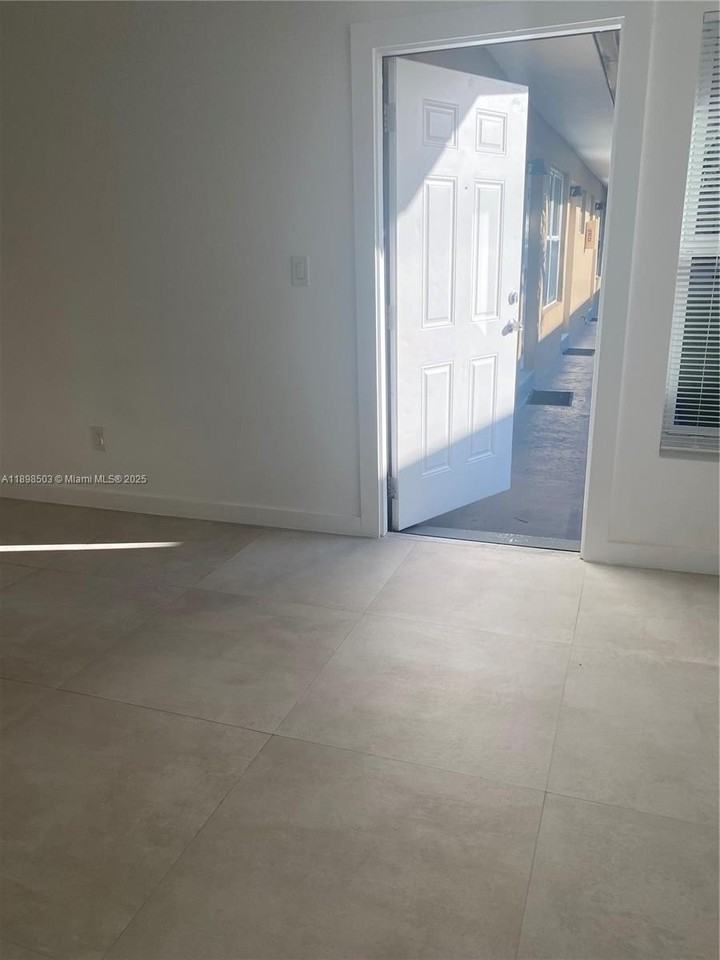 2011 Ne 167th St #6 - Photo 3 of 23