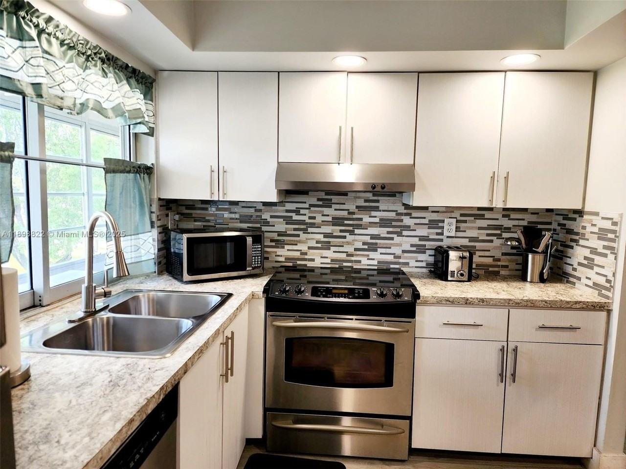 9101 Lime Bay Boulevard #305 - Photo 4 of 21