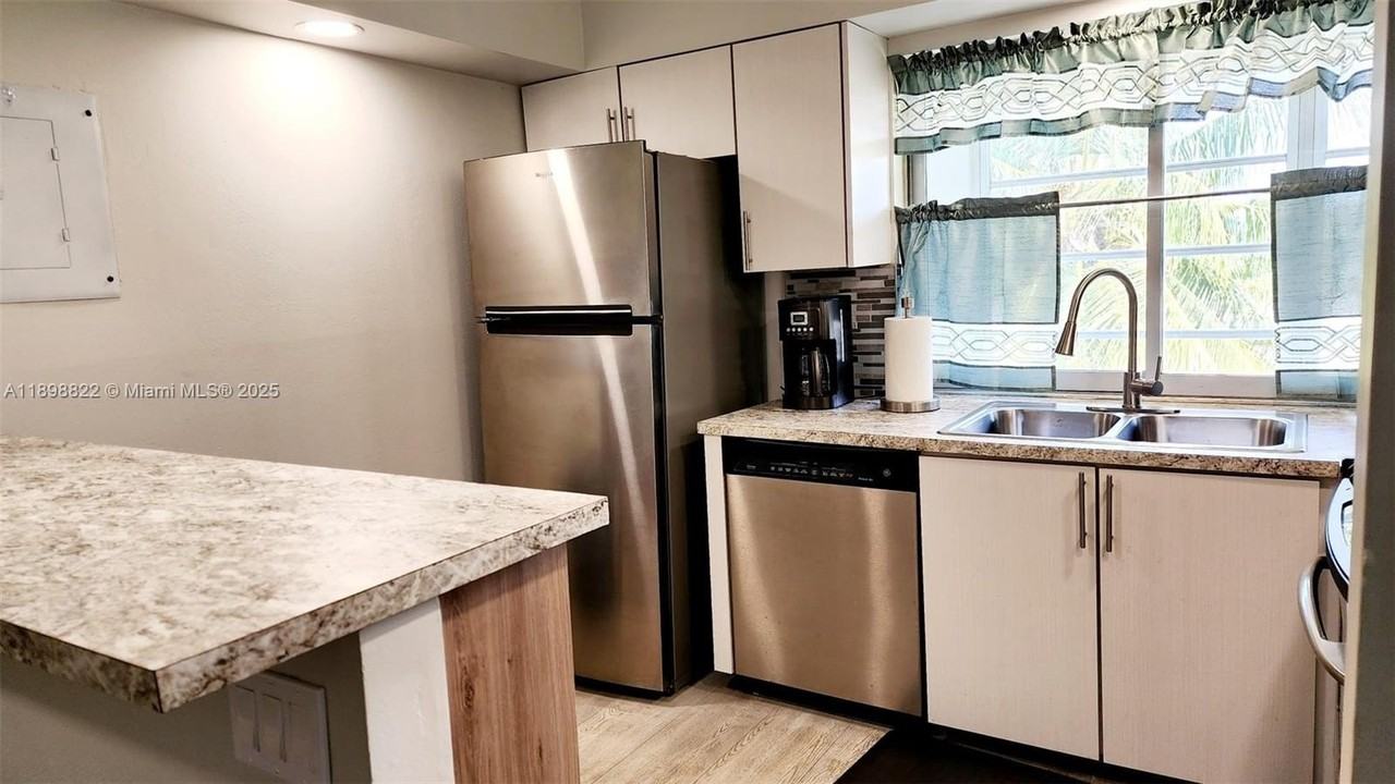 9101 Lime Bay Boulevard #305 - Photo 5 of 21