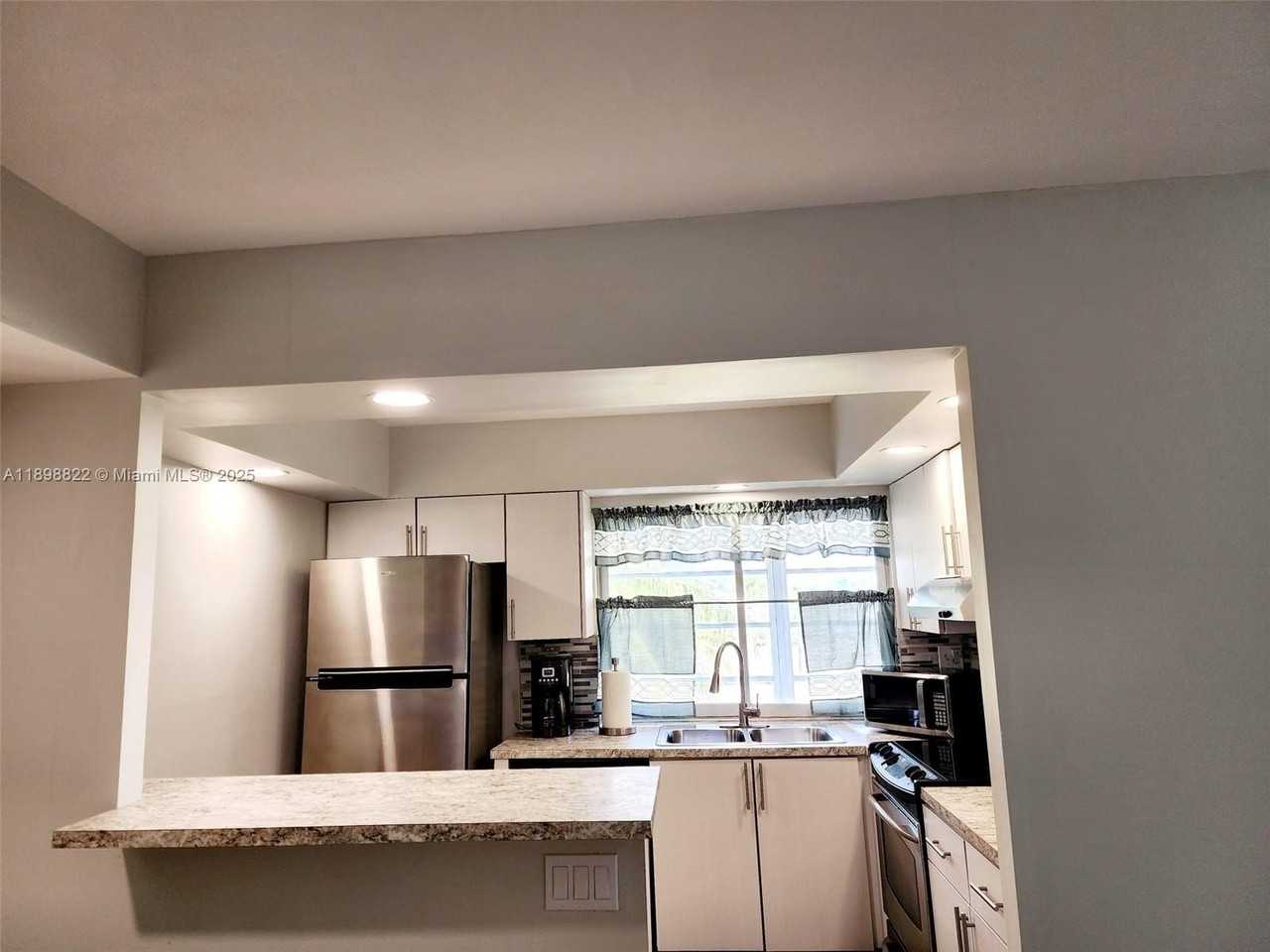 9101 Lime Bay Boulevard #305 - Photo 6 of 21