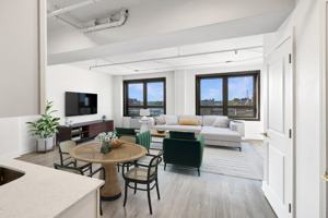 featured image of 323 W Broadway