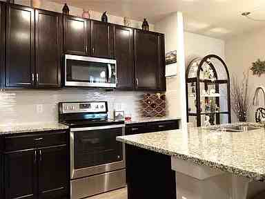 15274 West 64th Lane - Photo 2 of 13