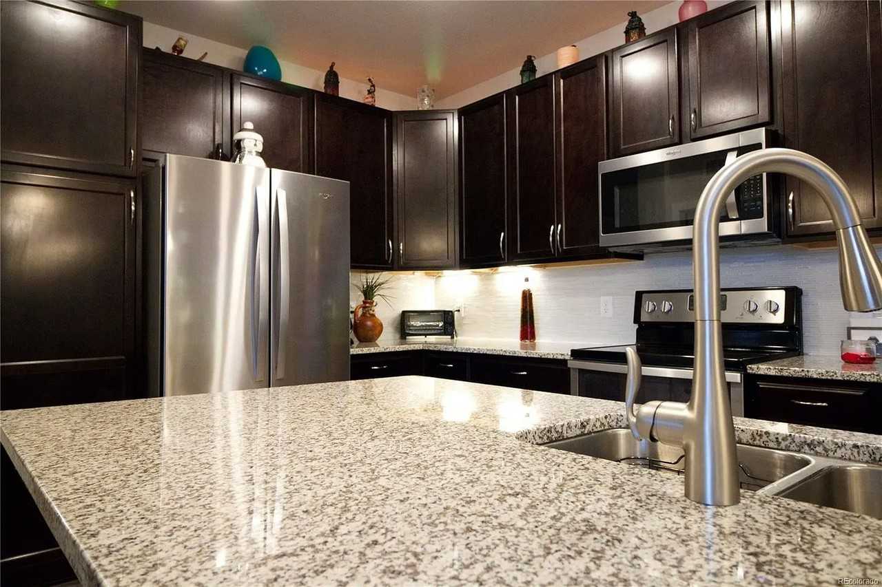 15274 West 64th Lane - Photo 3 of 13