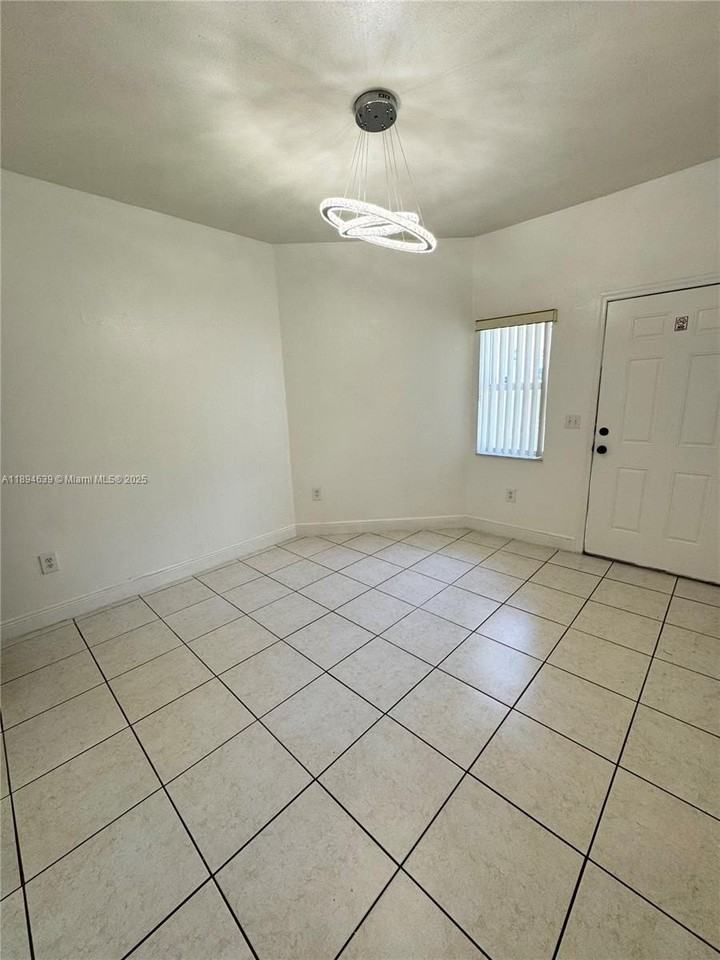 13705 Northeast 20th Place #3 - Photo 4 of 16