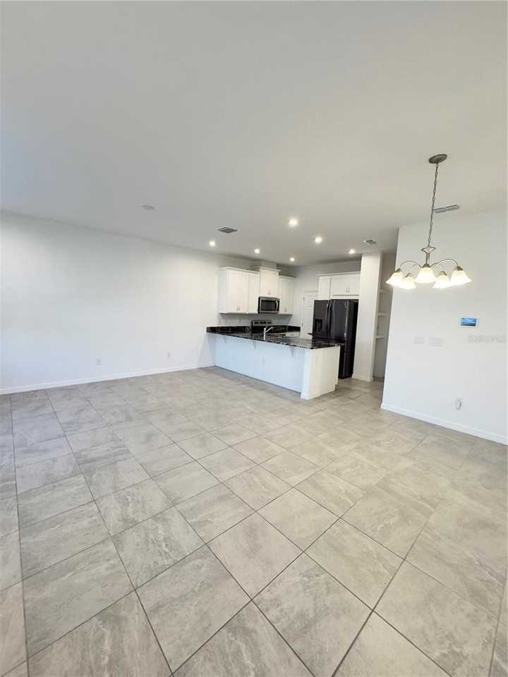 2512 Blowing Breeze Ave - Photo 5 of 22