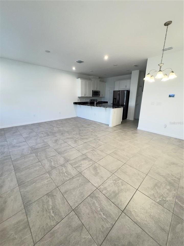 2512 Blowing Breeze Ave - Photo 6 of 22