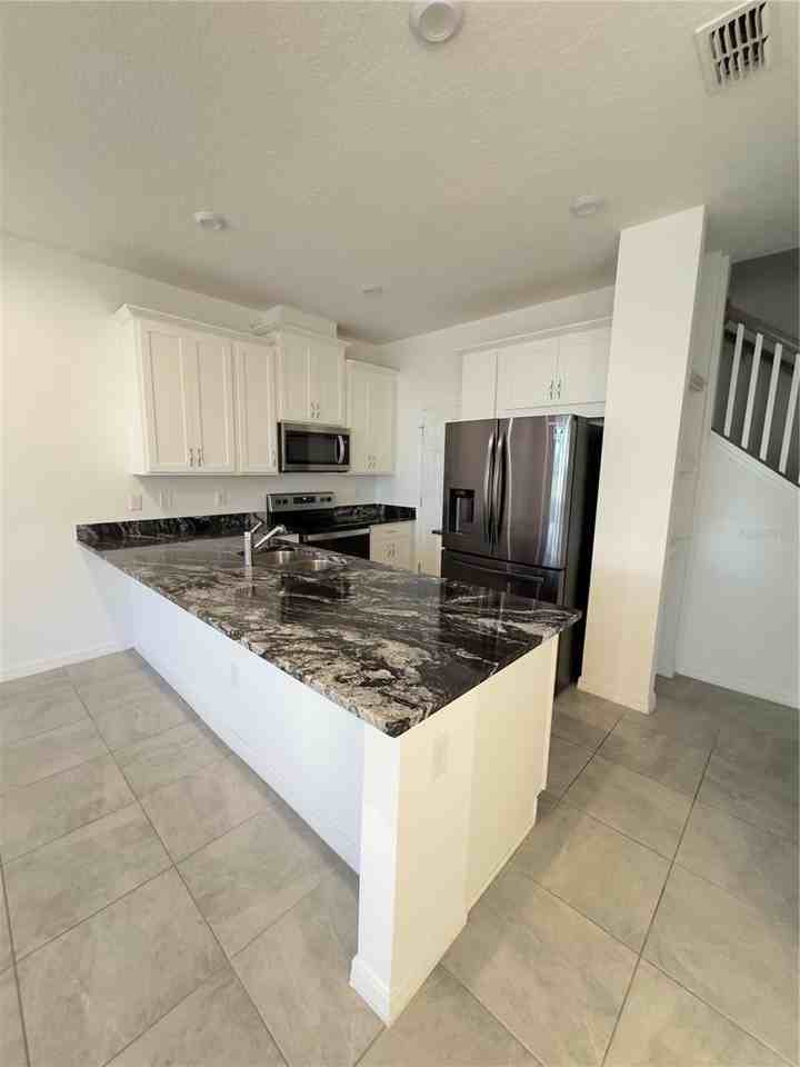 2512 Blowing Breeze Ave - Photo 7 of 22