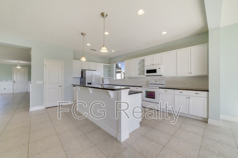 11701 Verrazano Dr - Photo 5 of 12