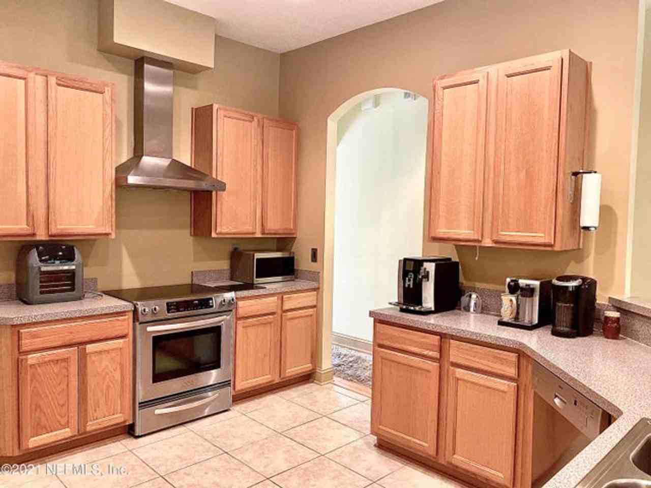 8699 Canopy Oaks Drive - Photo 2 of 24