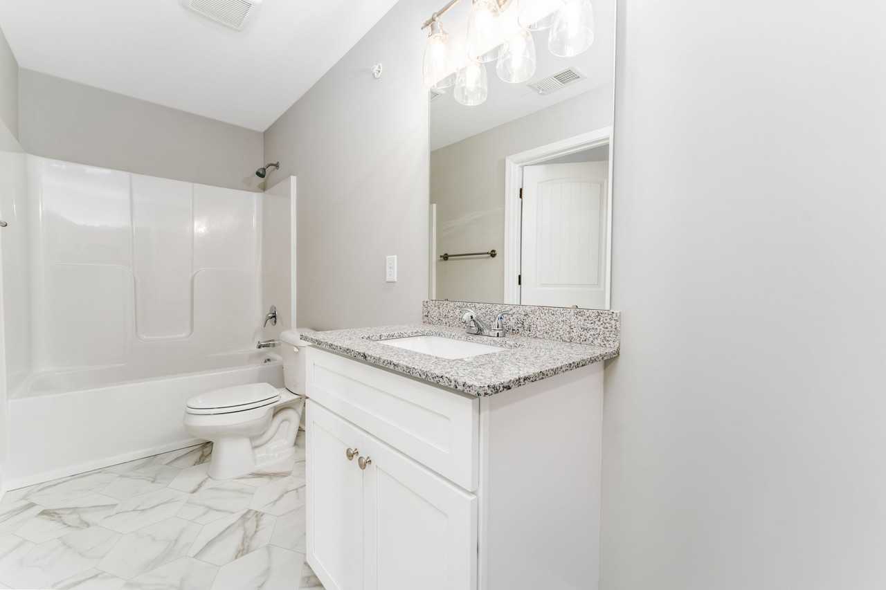 Stella's Place Apartments - Photo 2 of 20