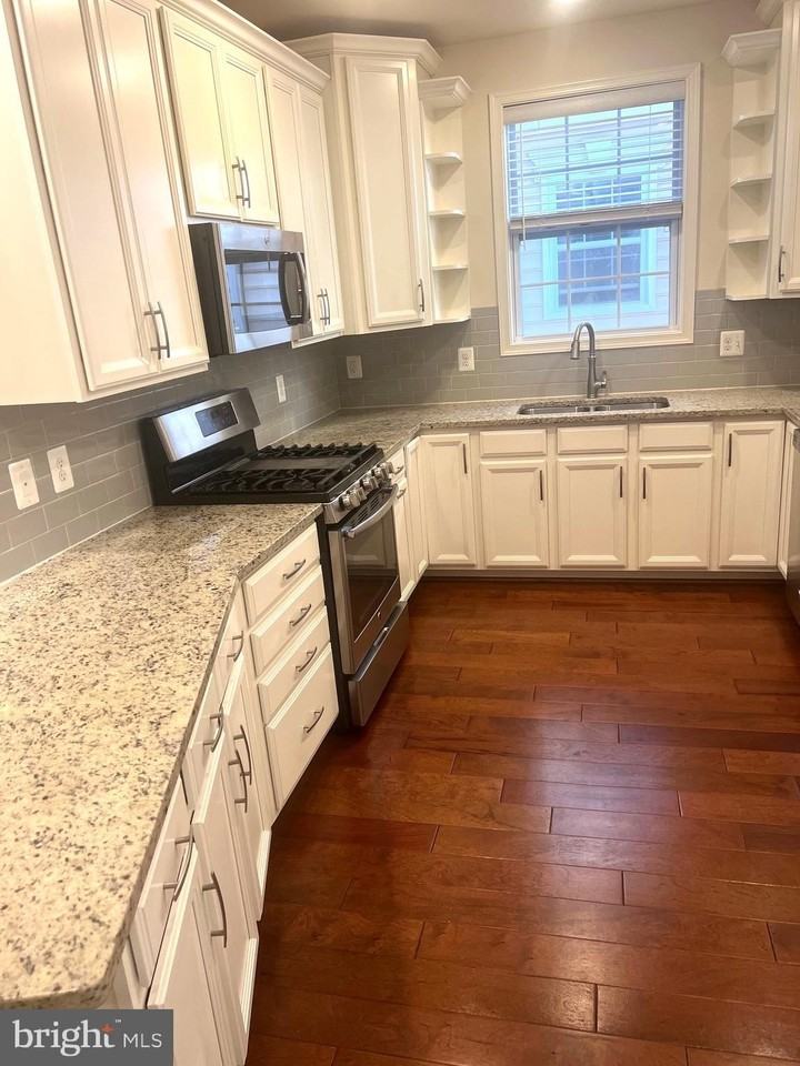 43031 Foxtrail Woods Ter Unit 107 #107 - Photo 5 of 38