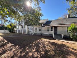 featured image of 233 E Broadway St