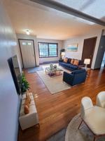 featured image of 115 E 5th St