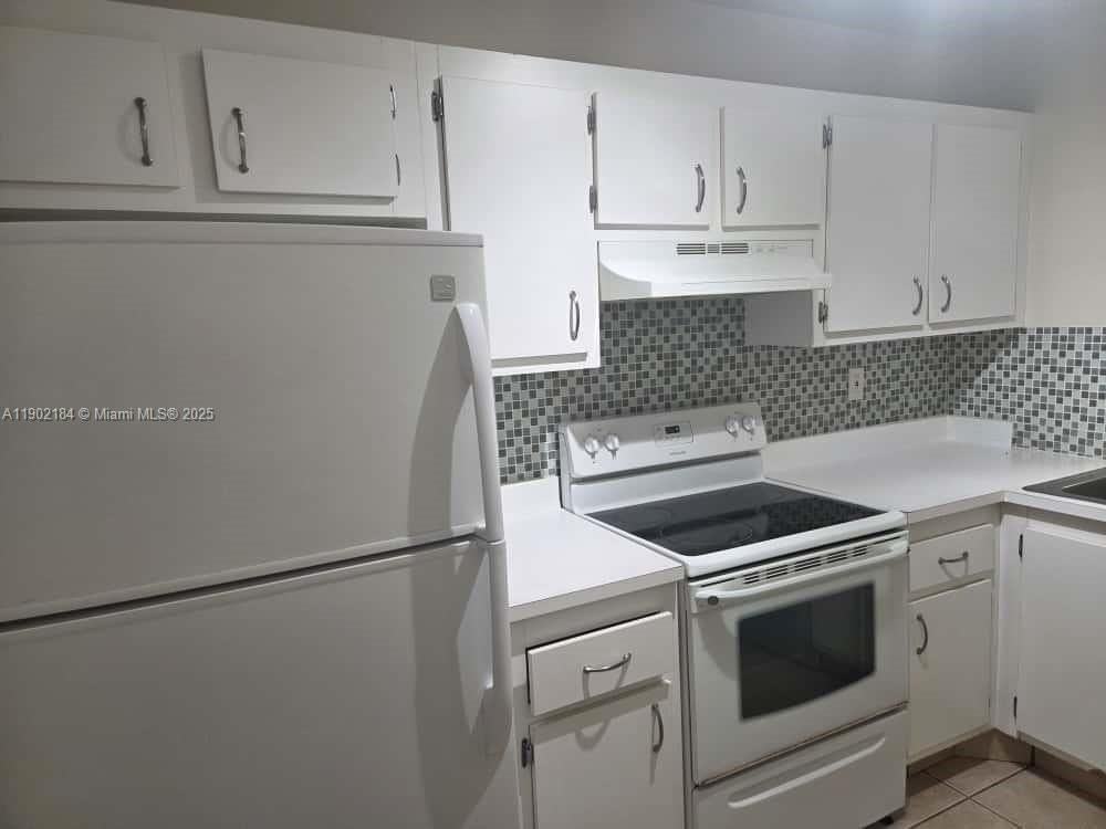 7406 Woodmont Terrace #105 - Photo 6 of 24