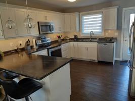 featured image of 166 Cougar Cres #1