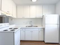 Modern Lakeside Living | 1 & 2 Bedroom Apartments with Parking and Pool! - Photo 1 of 1