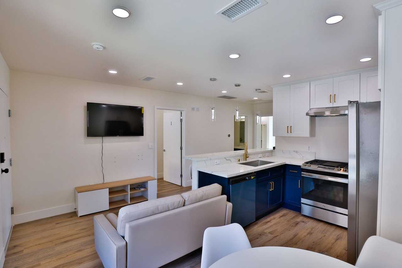 Sagittarius Apartments - Photo 3 of 31