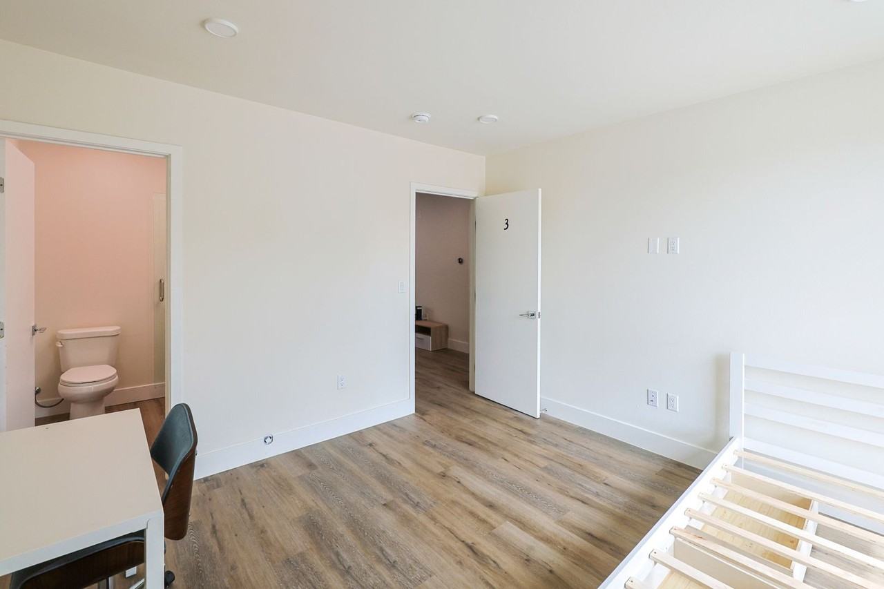 Sagittarius Apartments - Photo 7 of 31
