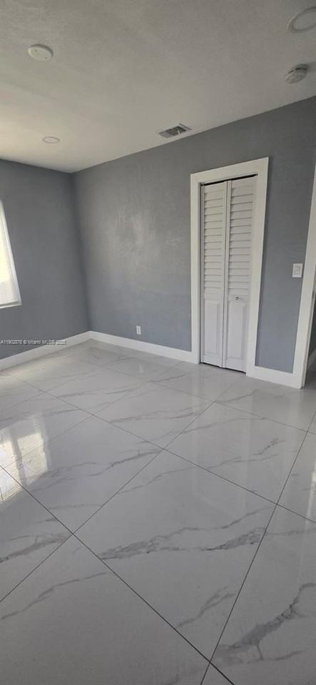 720 Nw 77th St - Photo 6 of 11