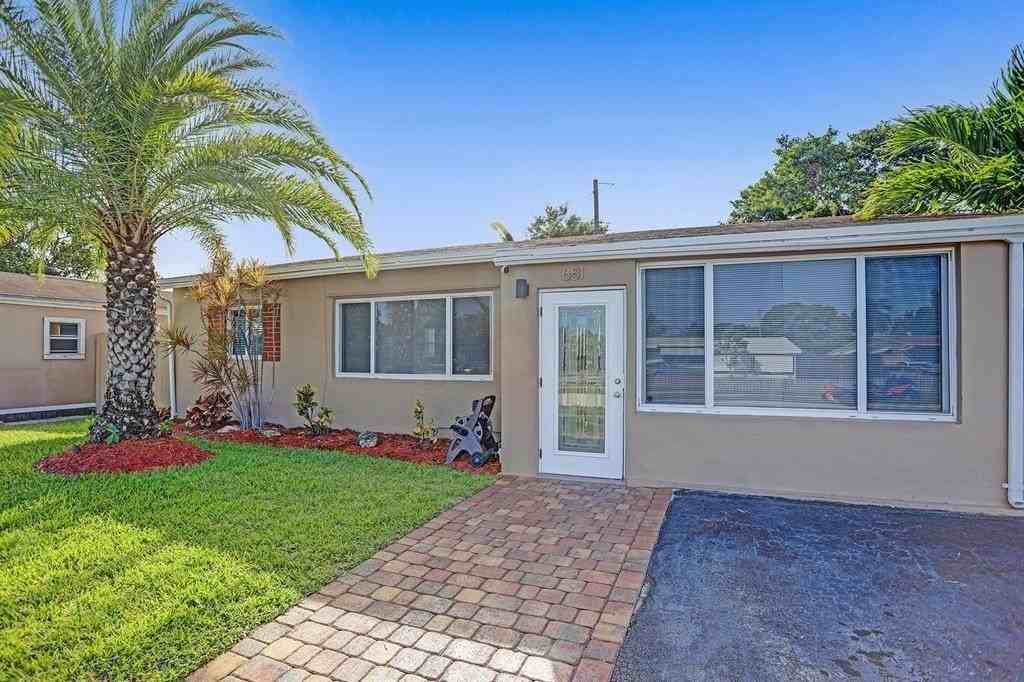 651 Northeast 59th Court - Photo 2 of 31