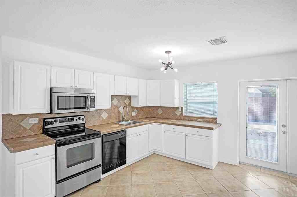 651 Northeast 59th Court - Photo 7 of 31