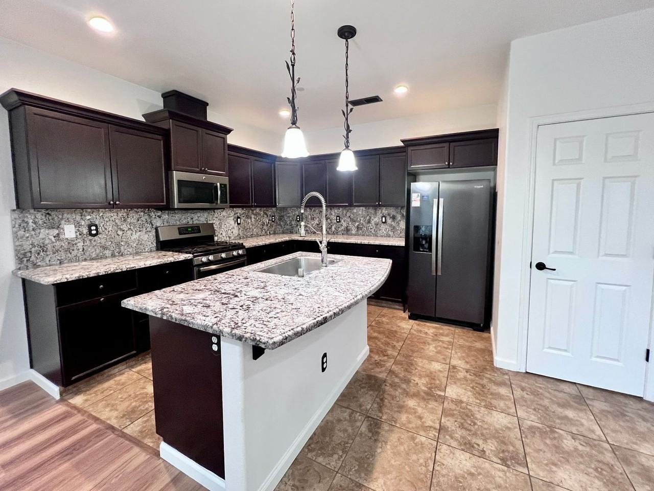 7018 N Brookdale Dr - Photo 2 of 33