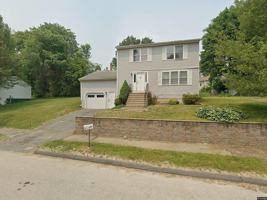 featured image of Travis St