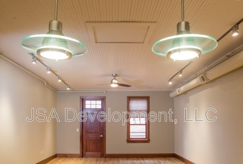 223 W 4th St - Photo 2 of 5