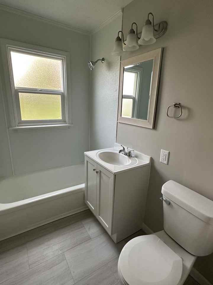 5616 E 101st Ter - Photo 5 of 7