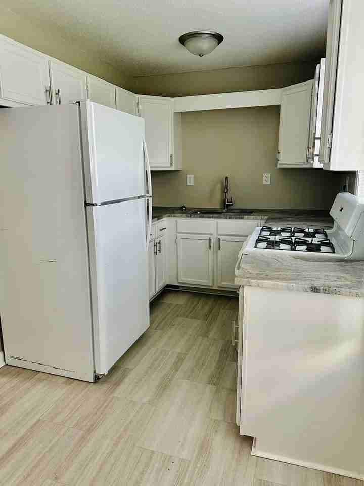 5616 E 101st Ter - Photo 7 of 7