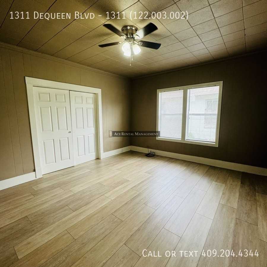 1311 Dequeen Blvd - Photo 2 of 12