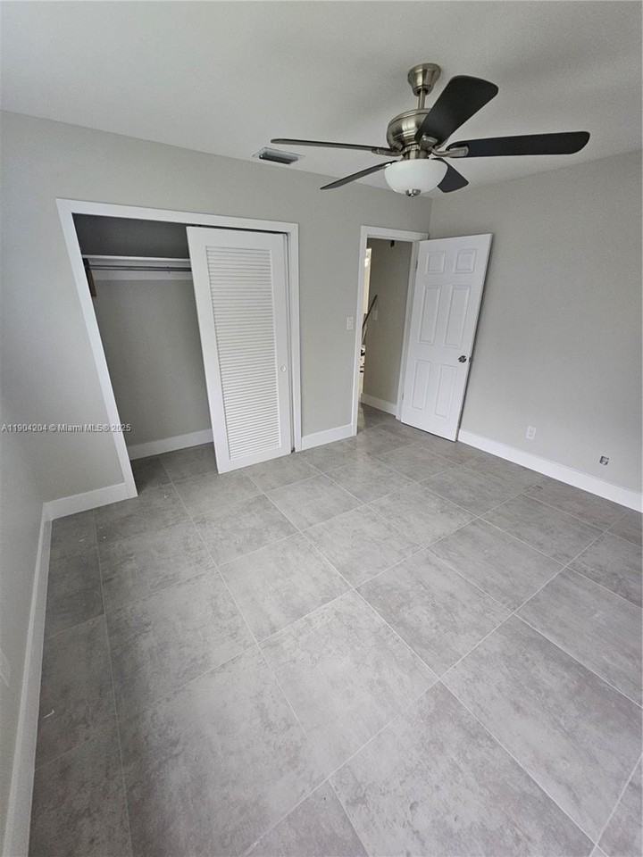 7302 Northwest 76th Drive #1-2 - Photo 2 of 12