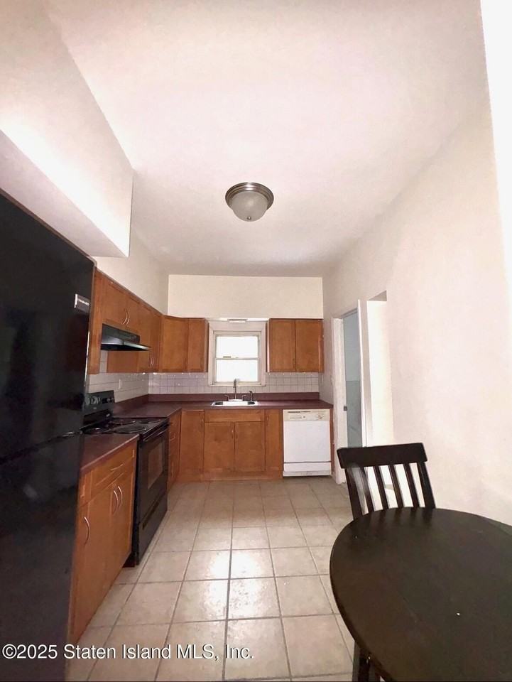 5448 Arthur Kill Rd 2nd Fl #2ndFL - Photo 7 of 11