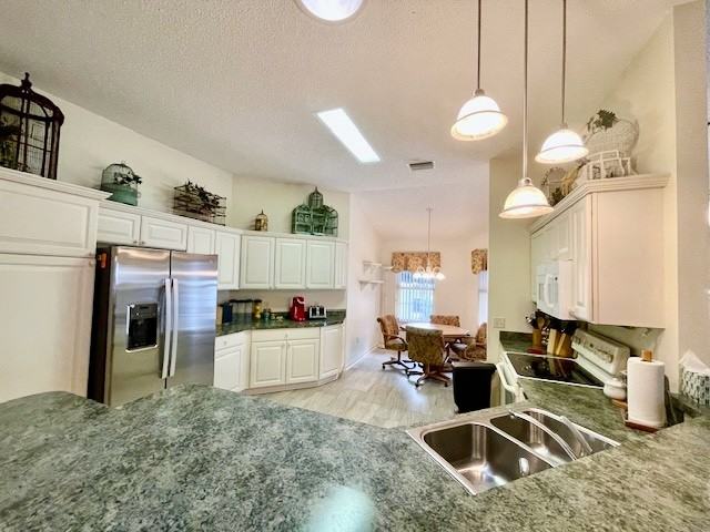 7781 Southeast 166th Smallwood Place - Photo 3 of 32