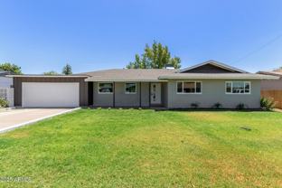 1311 E 2nd Pl - Photo 1 of 1