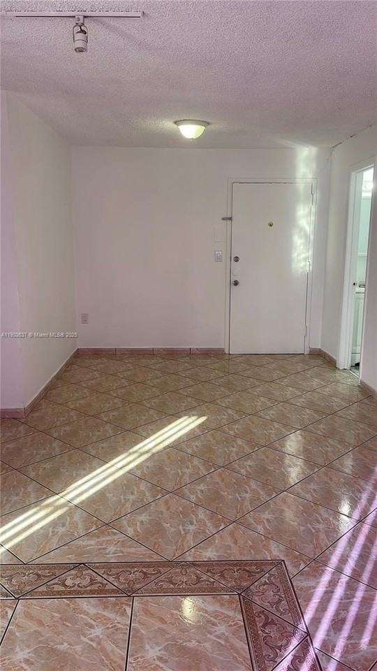 4801 Nw 7th St #703-16 - Photo 2 of 9