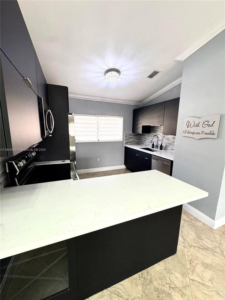 7870 W 29th Way #201 - Photo 6 of 18