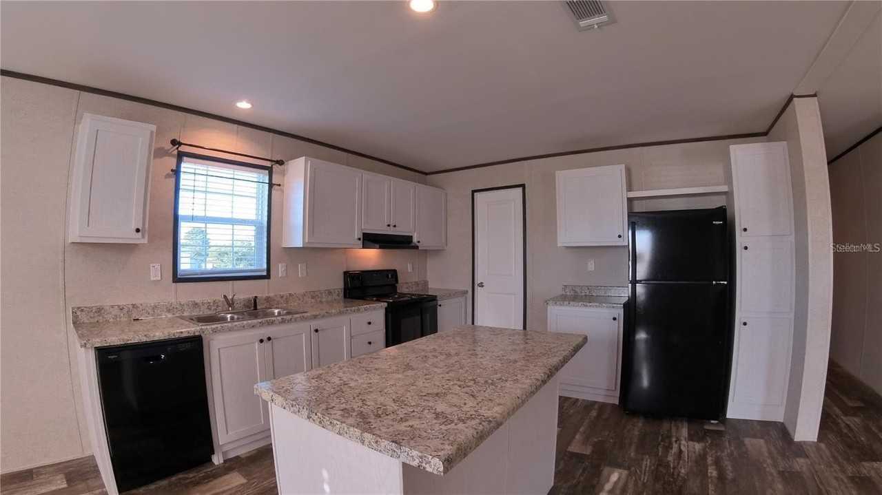 9722 Scepter Ave - Photo 4 of 13