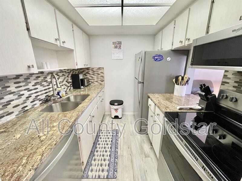 25 Quails Run Blvd #8 - Photo 7 of 13