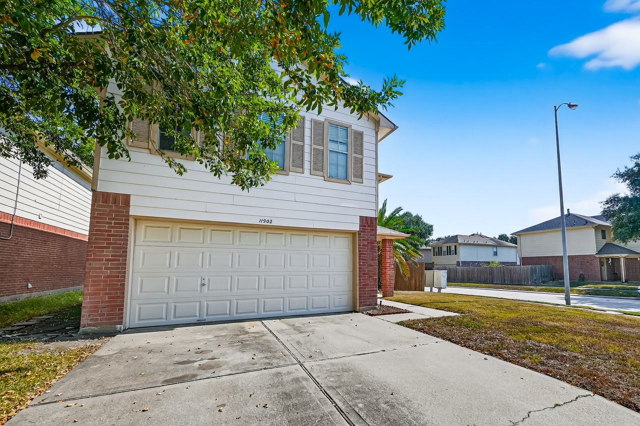 11902 Rolling Stream Dr - Photo 2 of 47