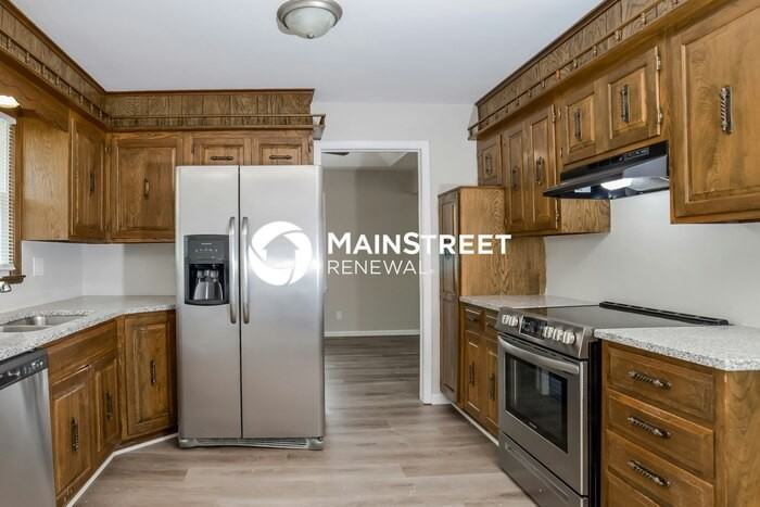 11716 East 60th Terrace - Photo 5 of 18