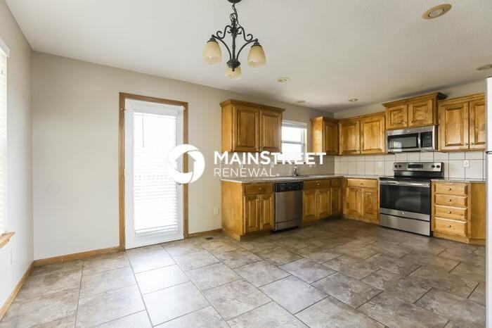 12210 East 56th Terrace - Photo 5 of 17